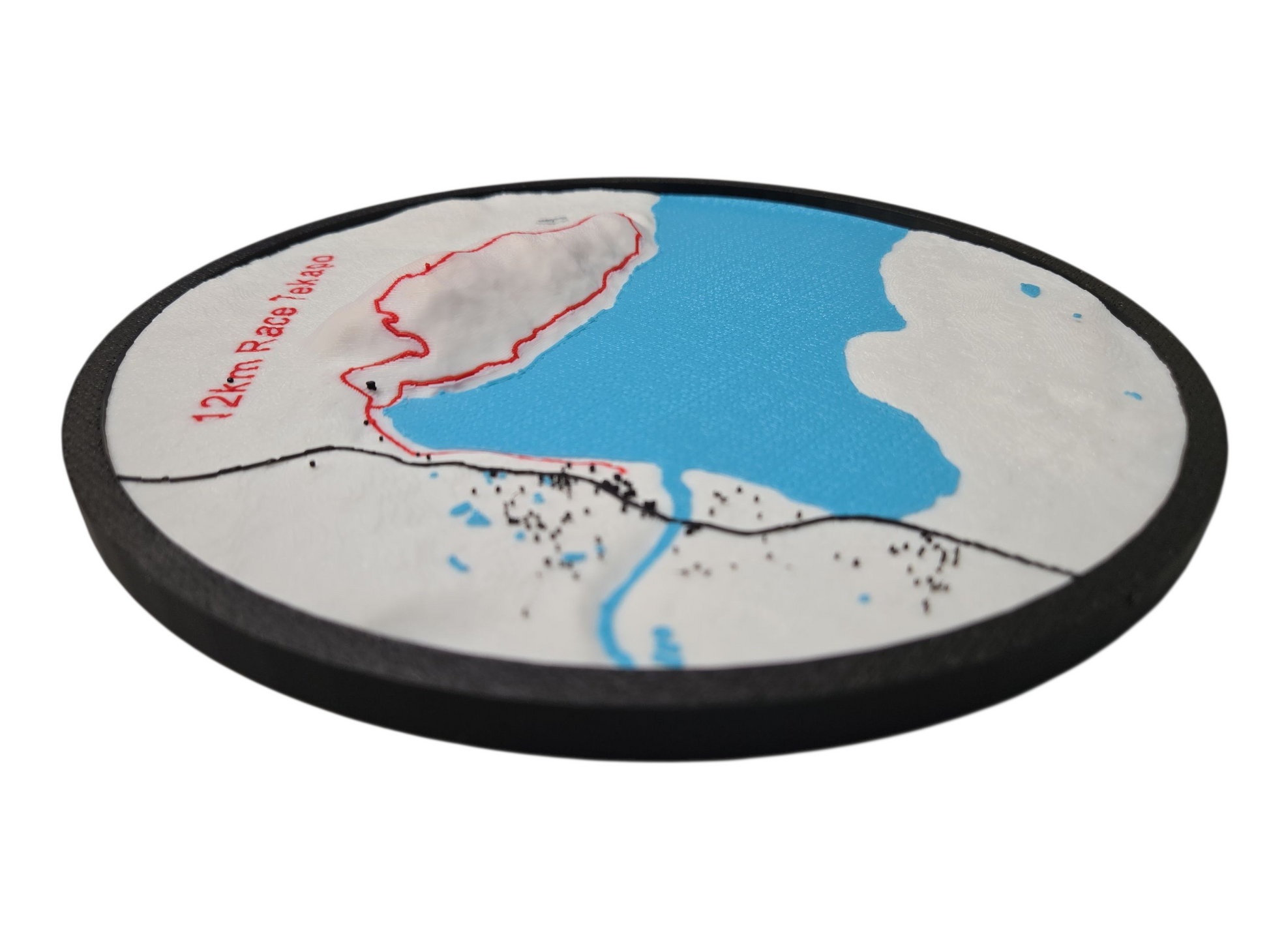Round map coaster with a black border on a white background