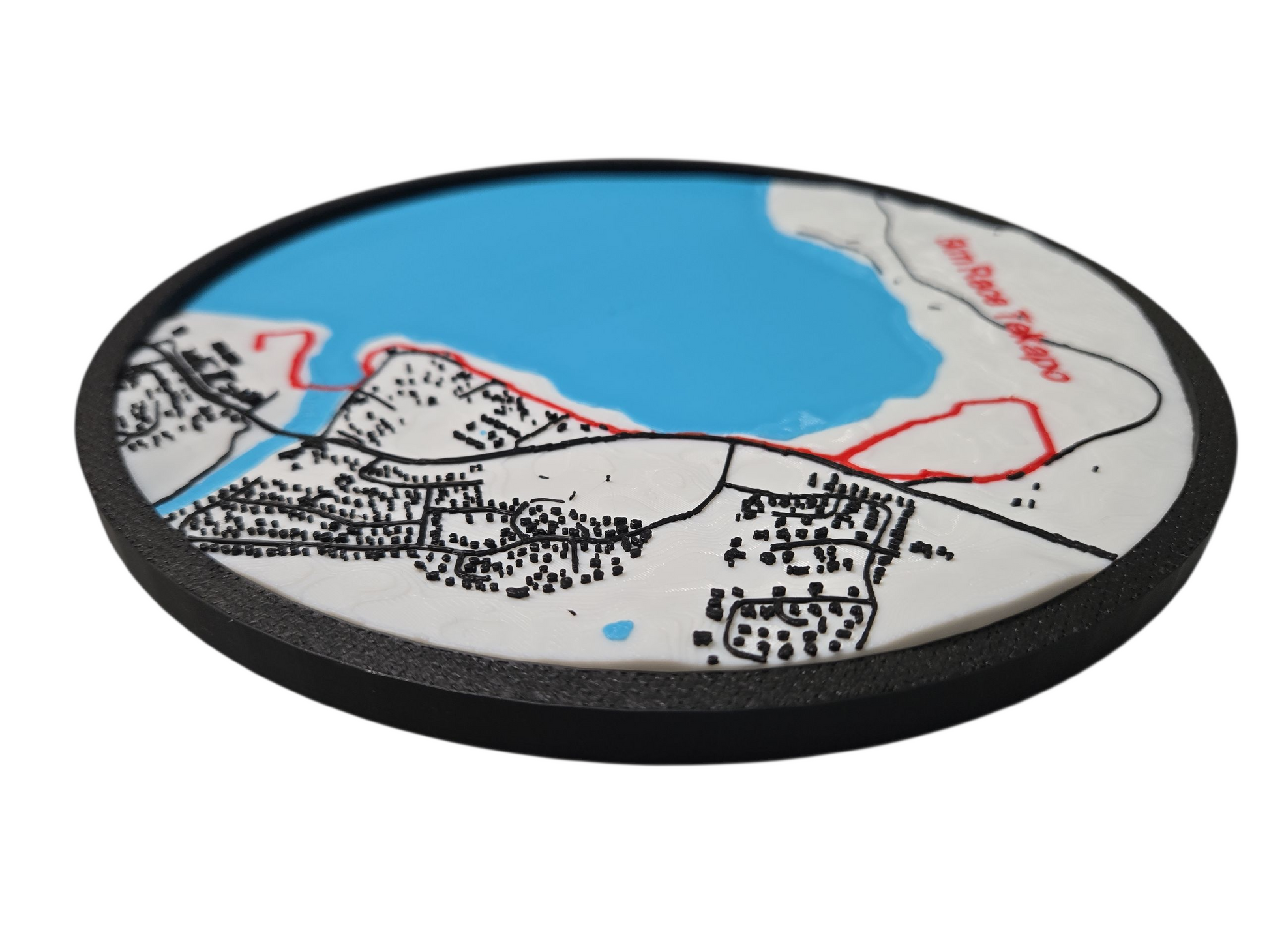Round coaster with a map design on a white background